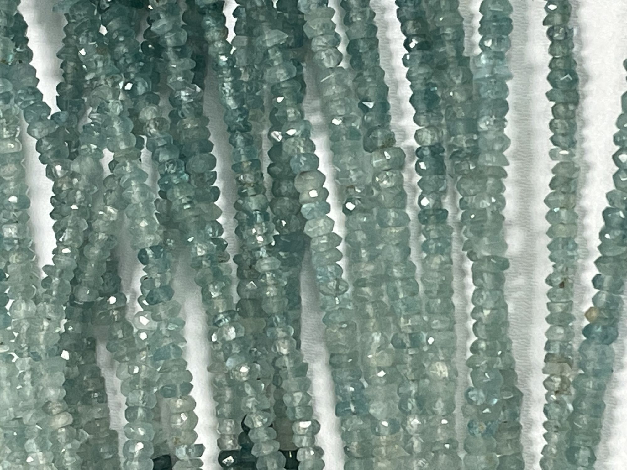 Shaded Grandidierite Rondelle Faceted