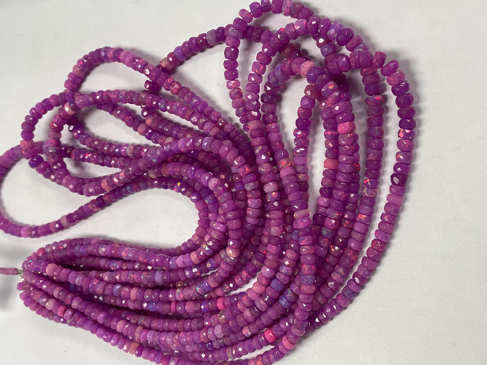 Purple Ethiopian Opal Rondelle Faceted