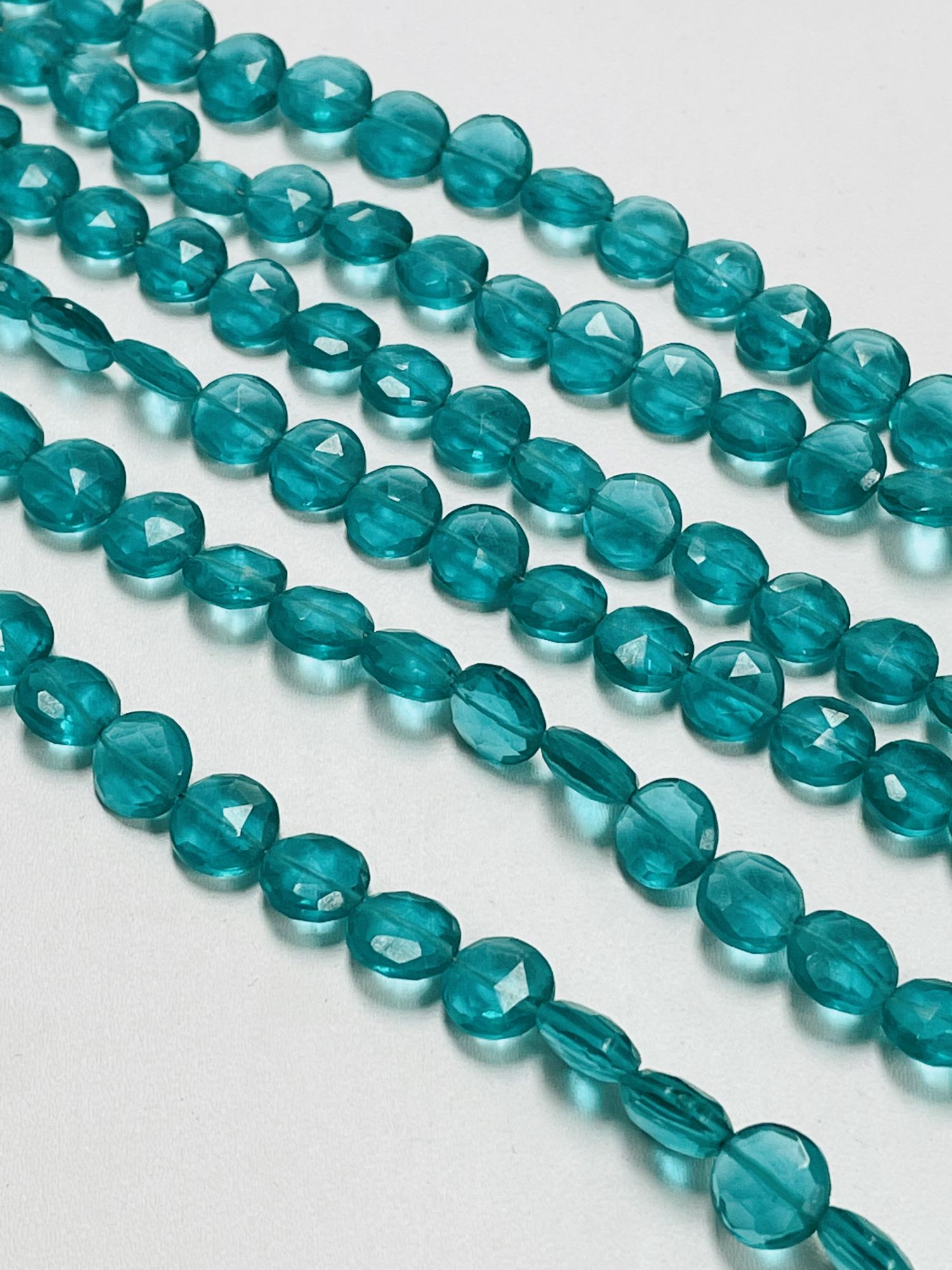 Neon Teal Hydro Quartz Coin Faceted