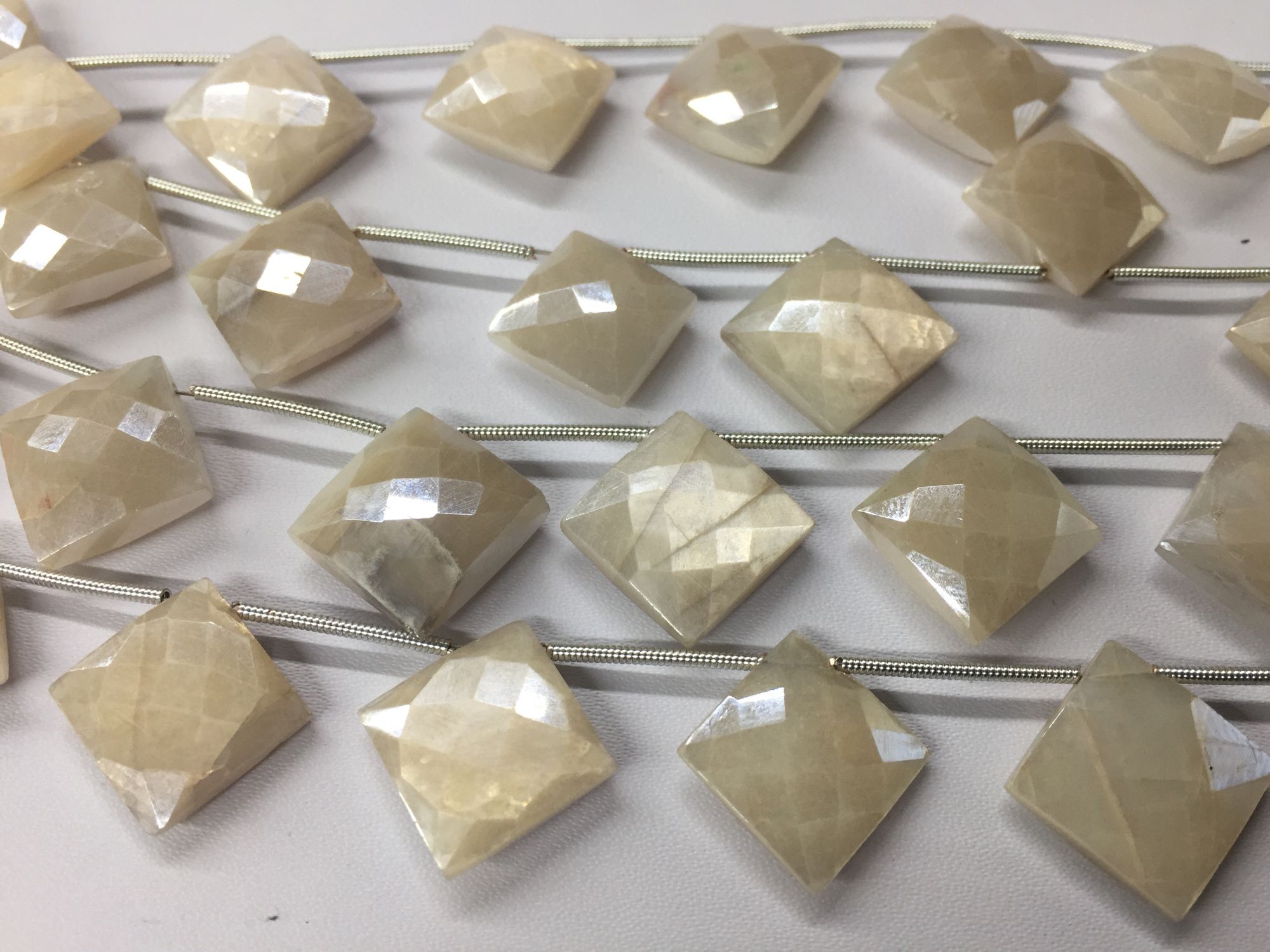 Coated Moonstone Cushion Faceted