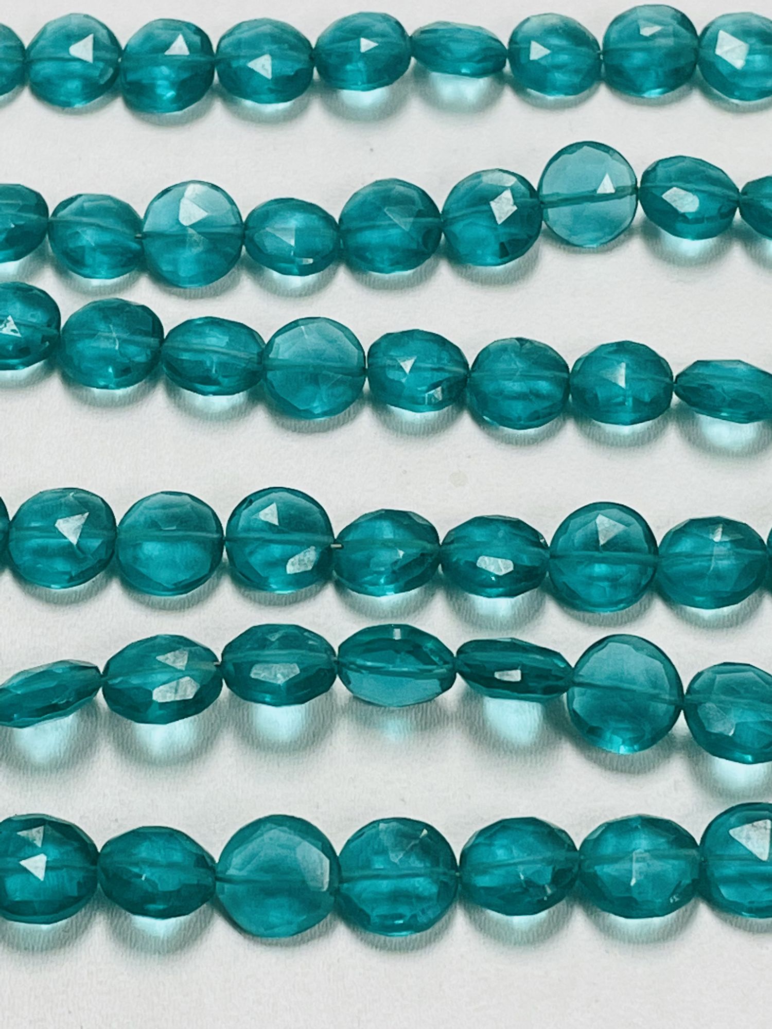 Neon Teal Hydro Quartz Coin Faceted