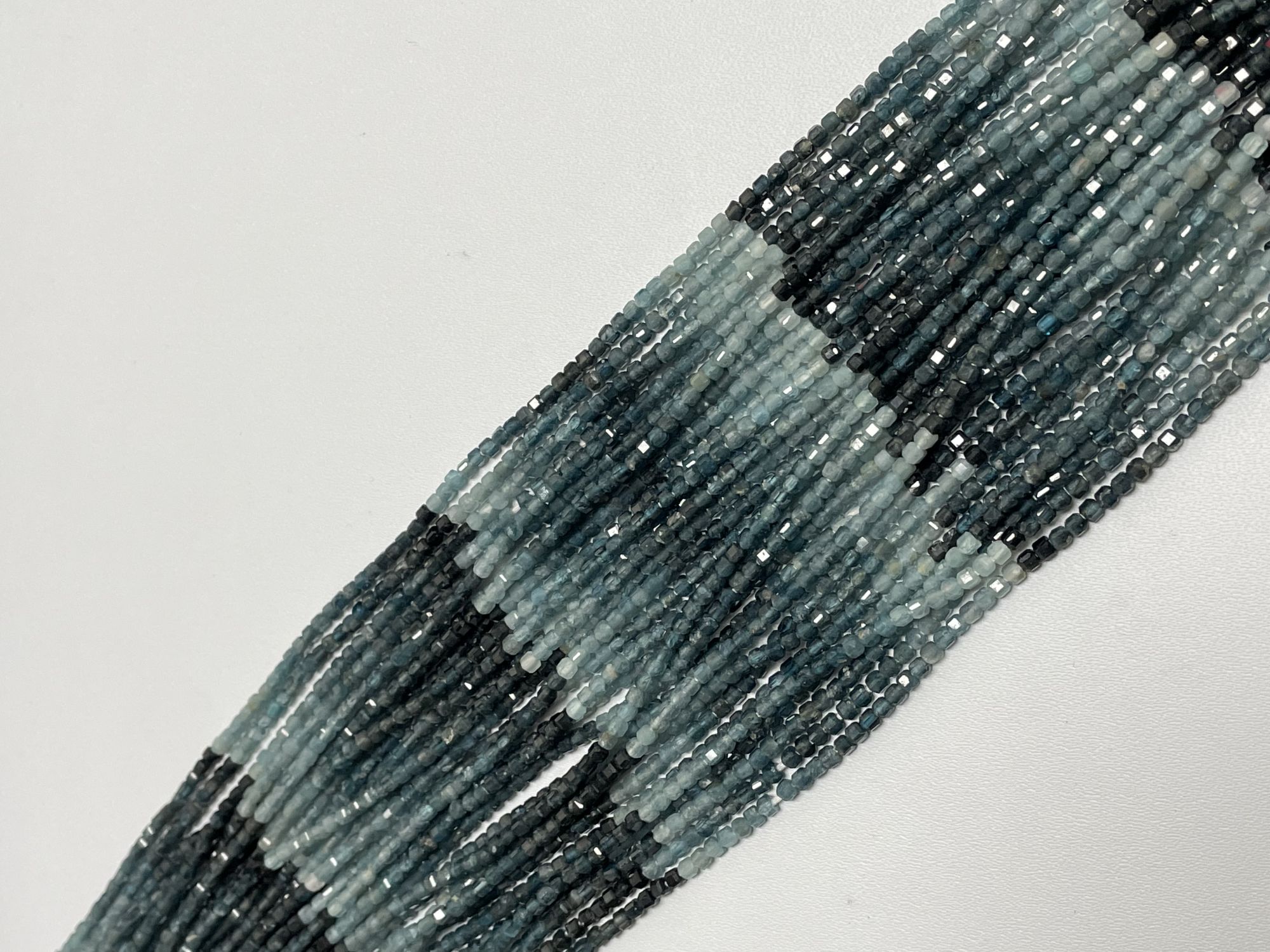 Shaded Grandidierite Rondelle Faceted