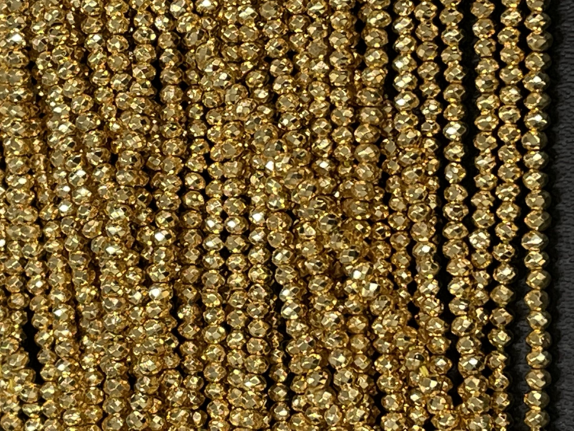 Coated Pyrite Rondelle Faceted