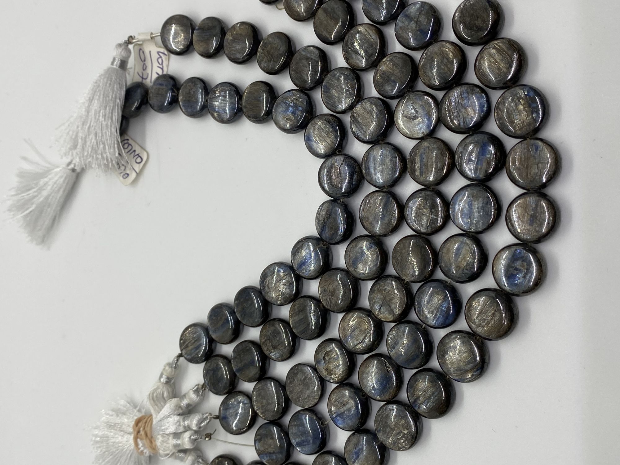 Coated Kyanite Coin Smooth