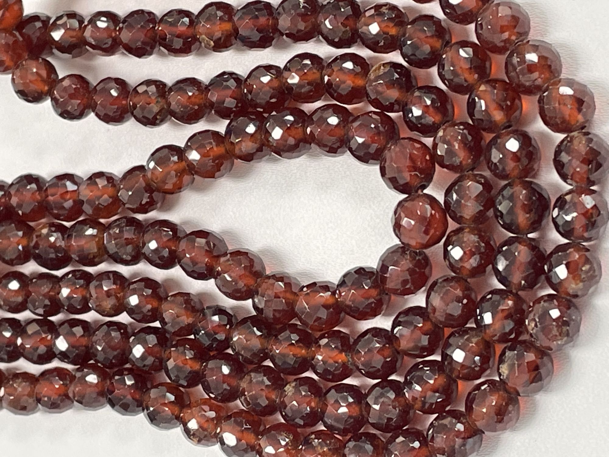 Hessonite Garnet Round Faceted