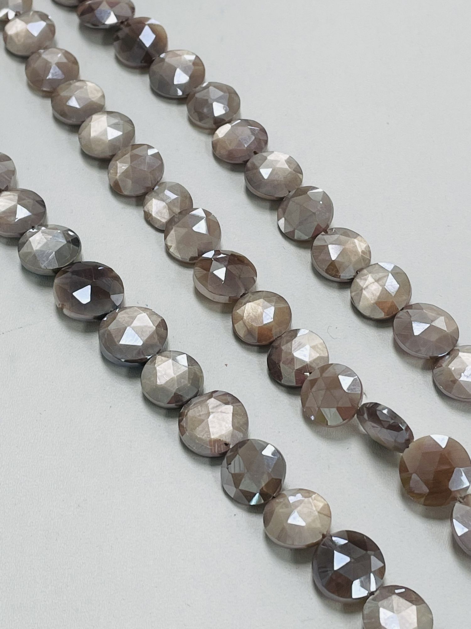 Coated Moonstone Coin Faceted