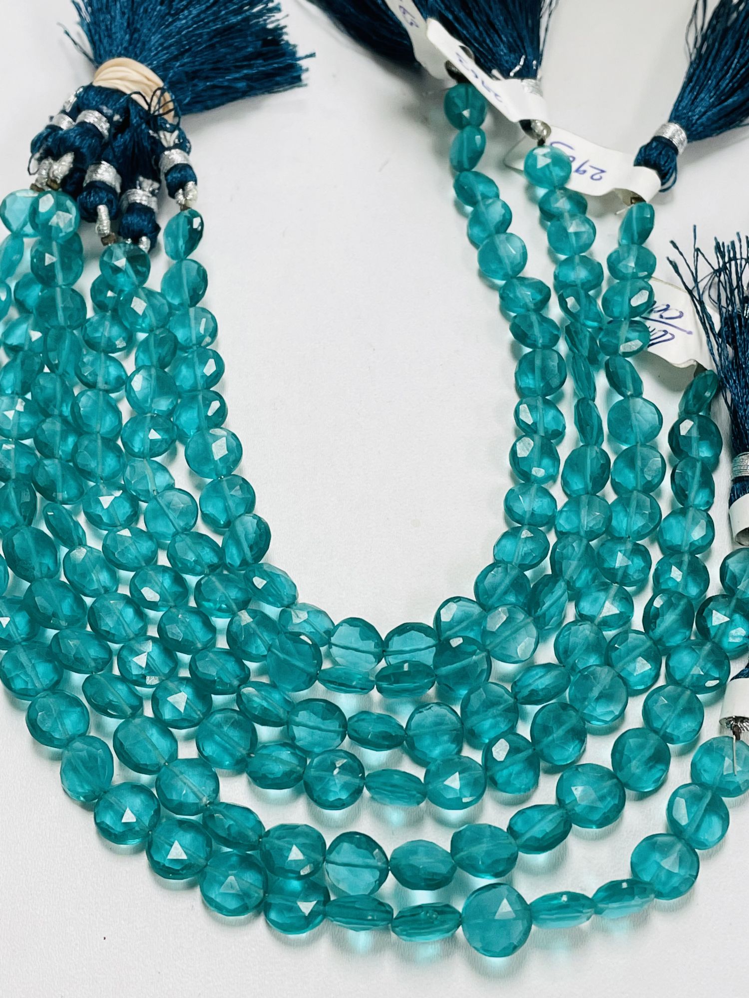 Neon Teal Hydro Quartz Coin Faceted