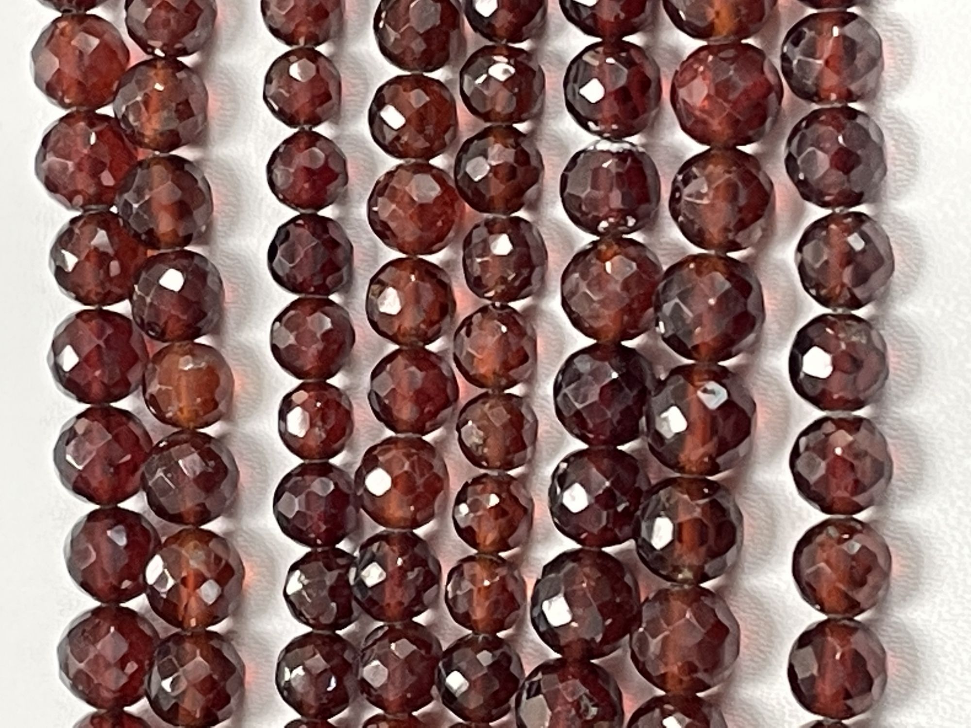 Hessonite Garnet Round Faceted