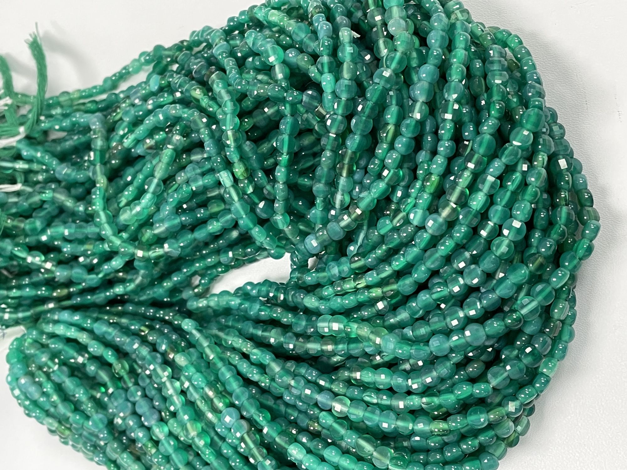 Shaded Green Onyx Coin Faceted