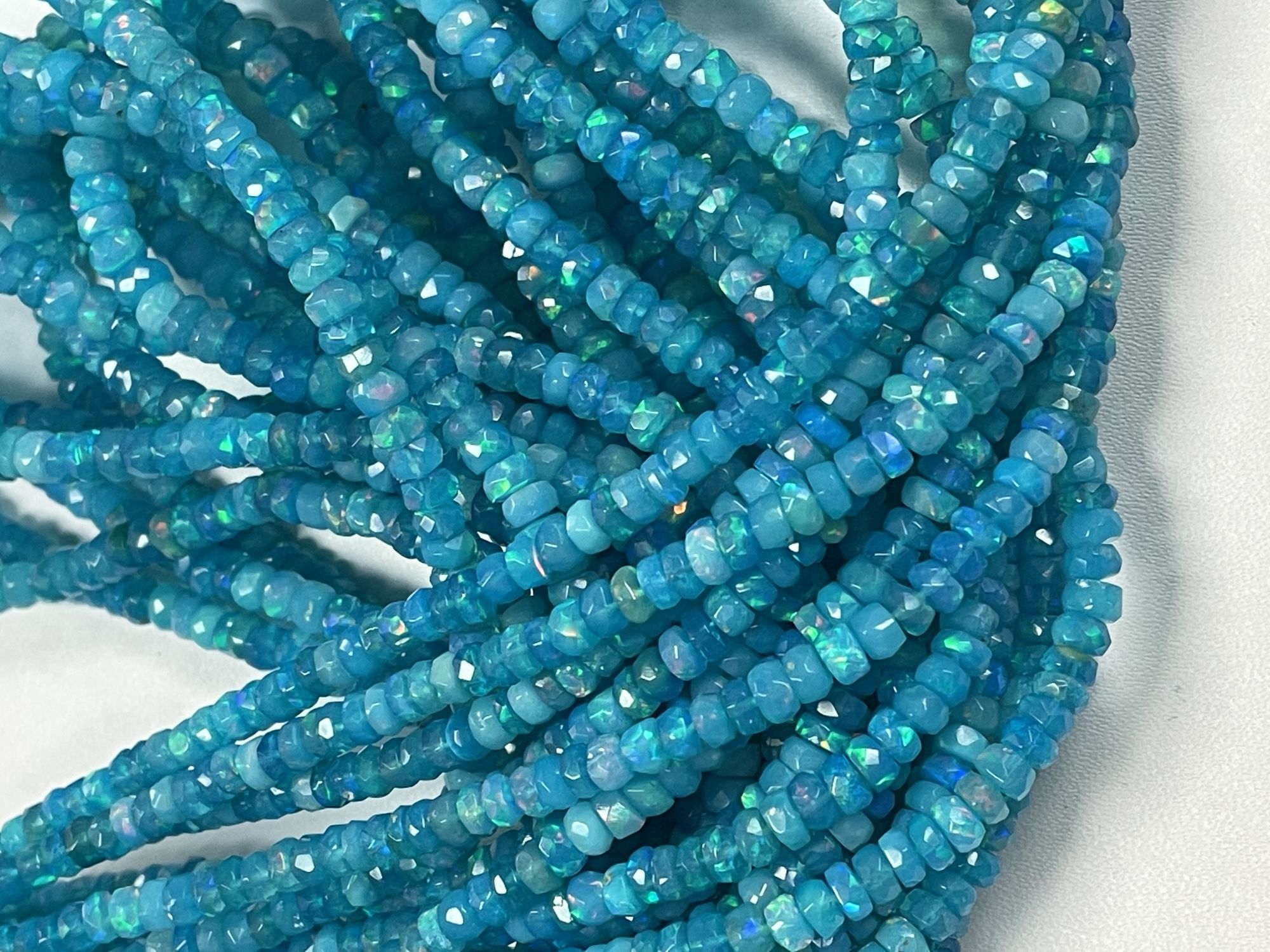 Blue Ethiopian Opal Rondelle Faceted