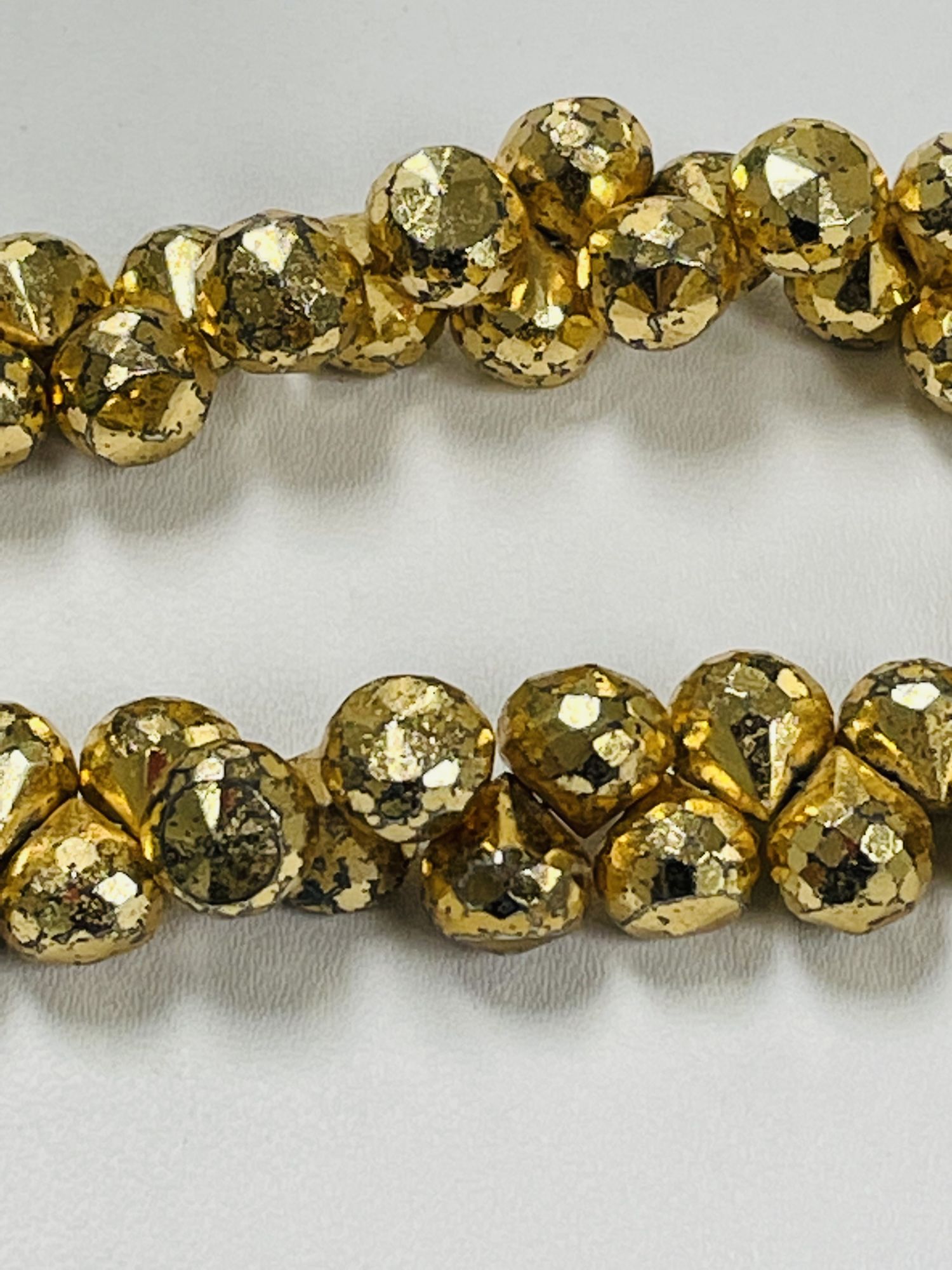 Gold Coated Pyrite Onions Faceted