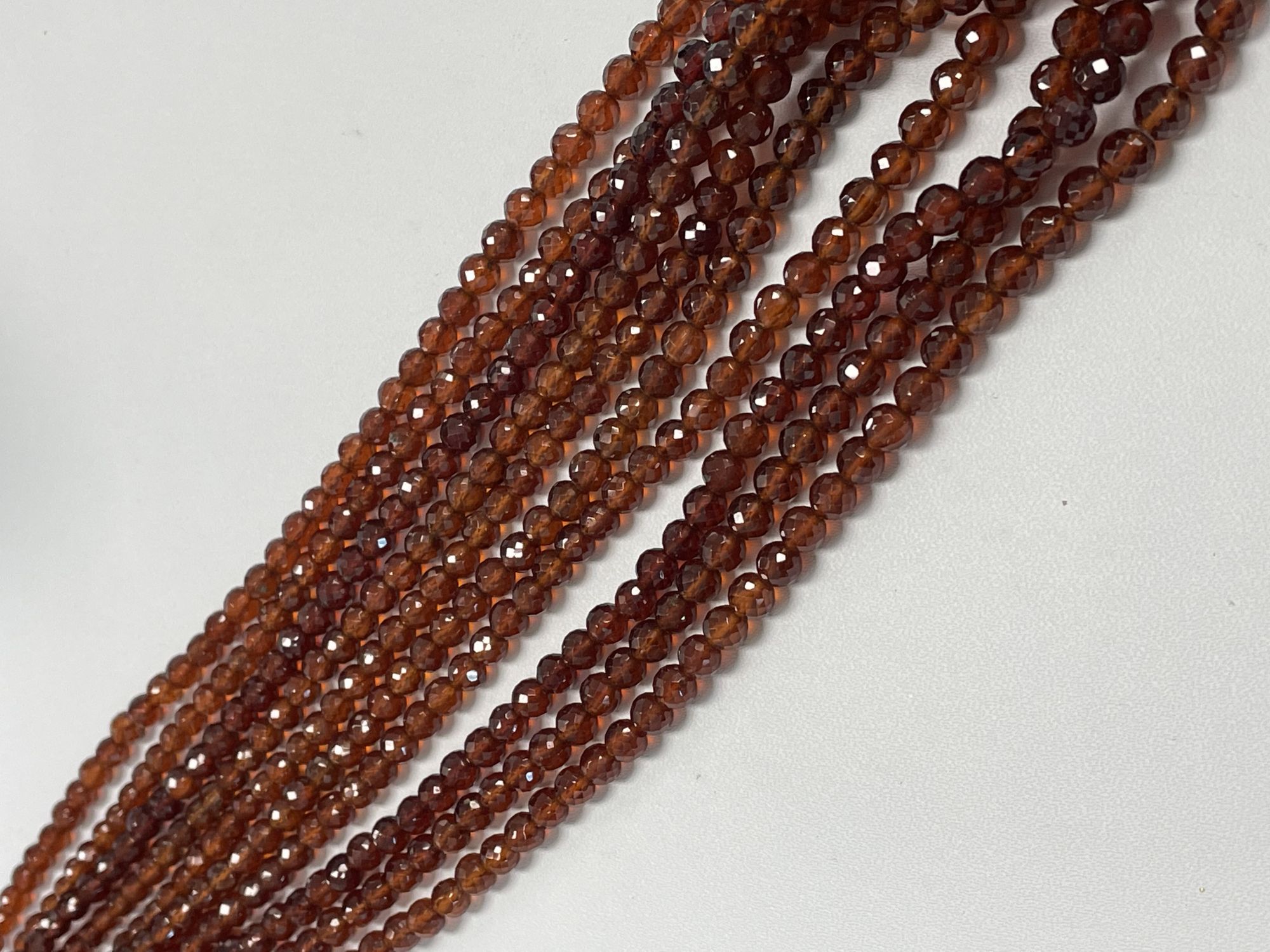 Hessonite Garnet Round Faceted