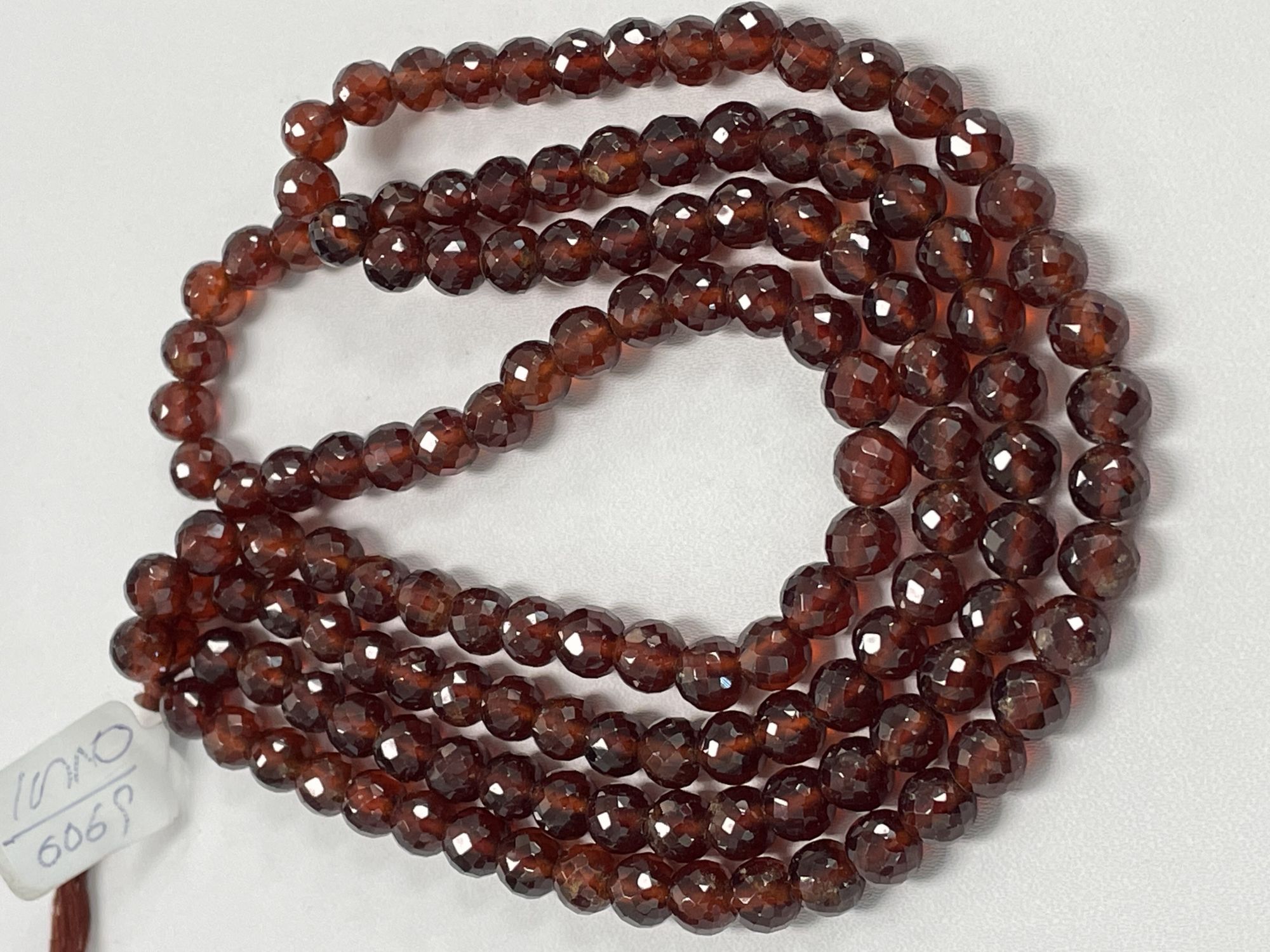 Hessonite Garnet Round Faceted