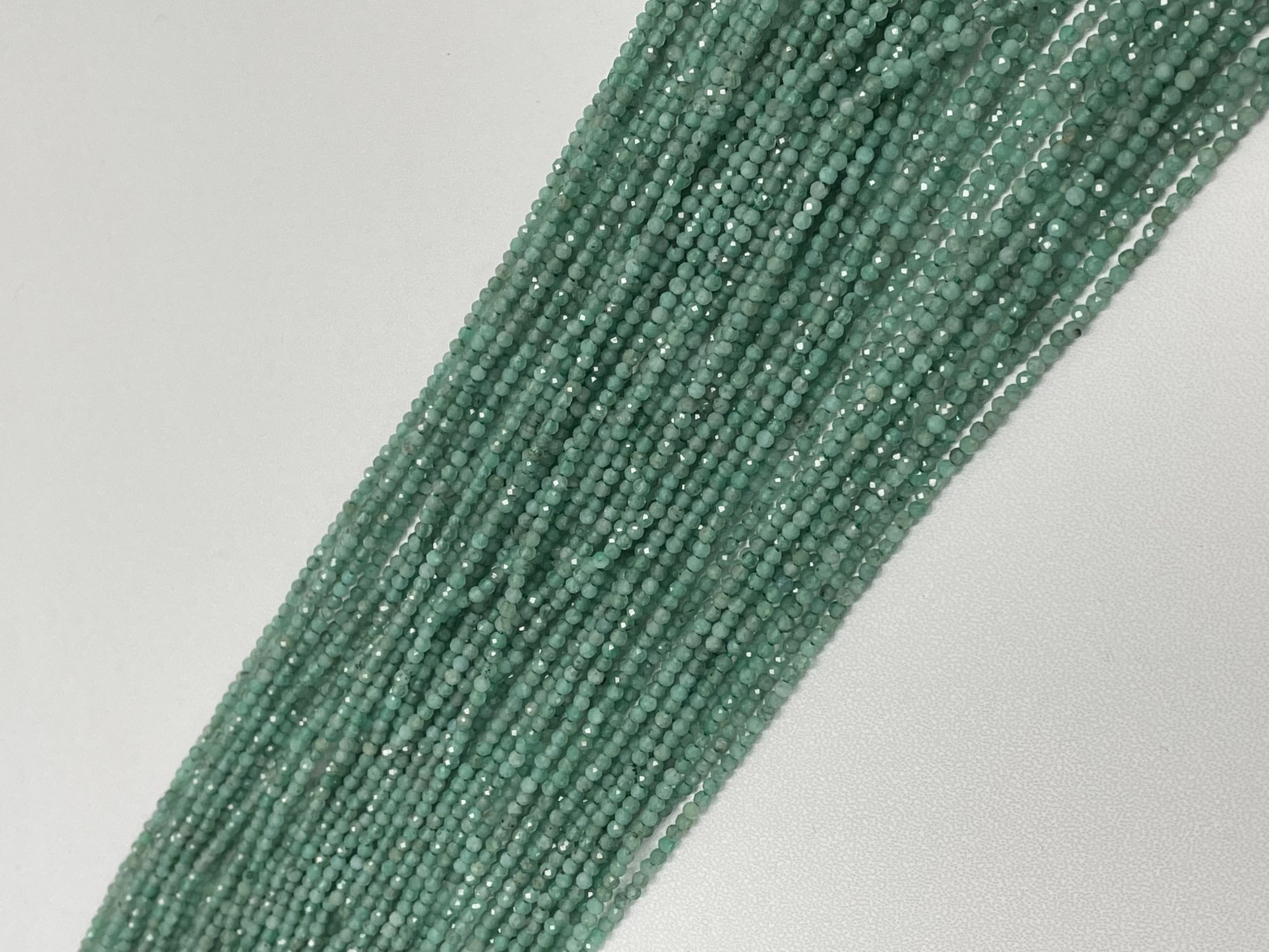 Emerald Rondelle Faceted