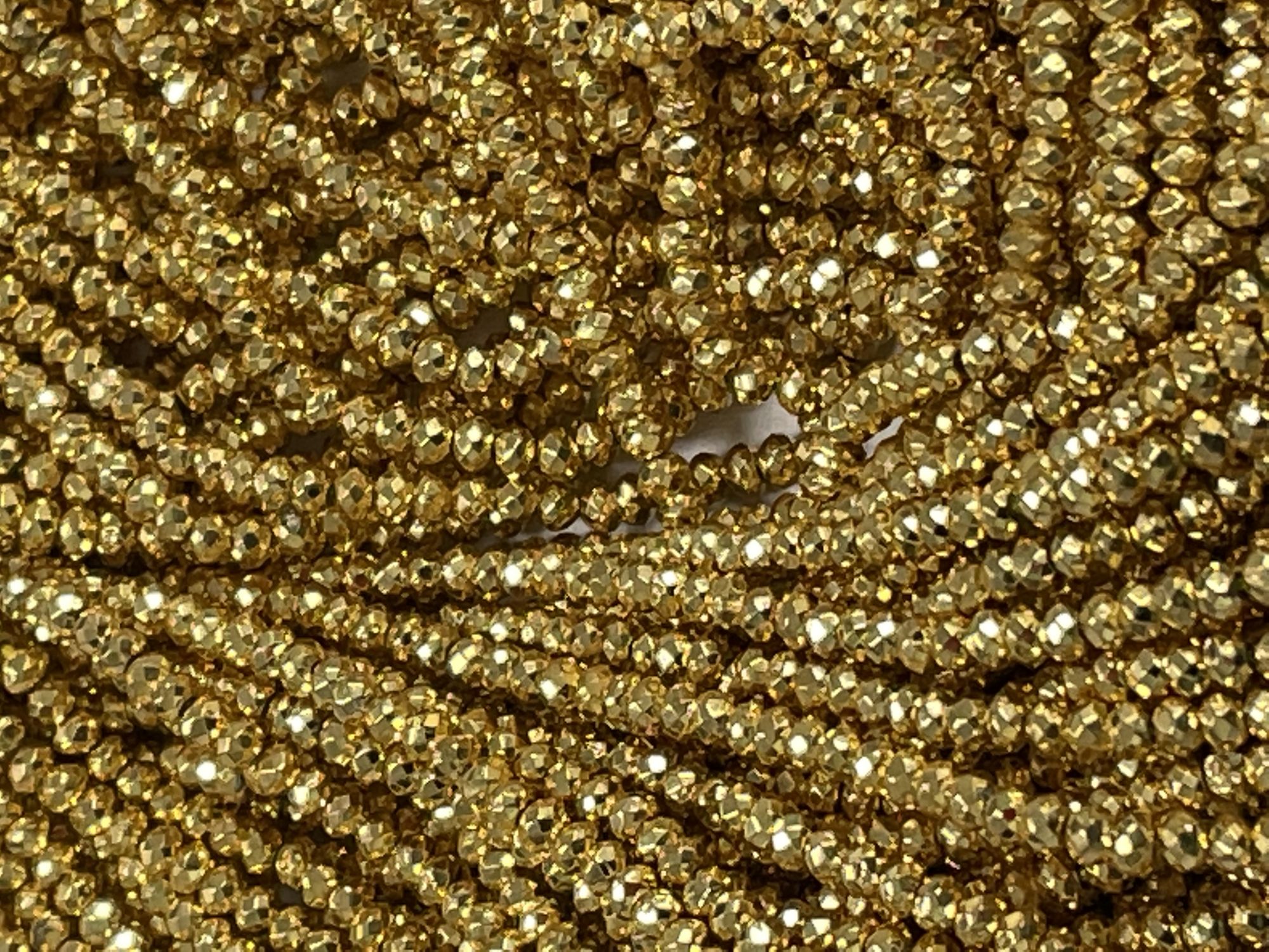 Coated Pyrite Rondelle Faceted