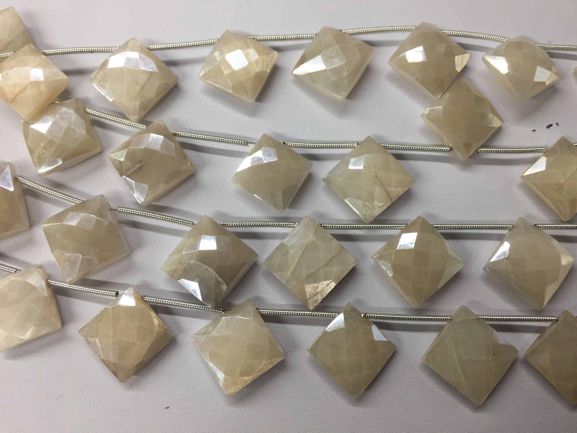 Coated Moonstone Cushion Faceted