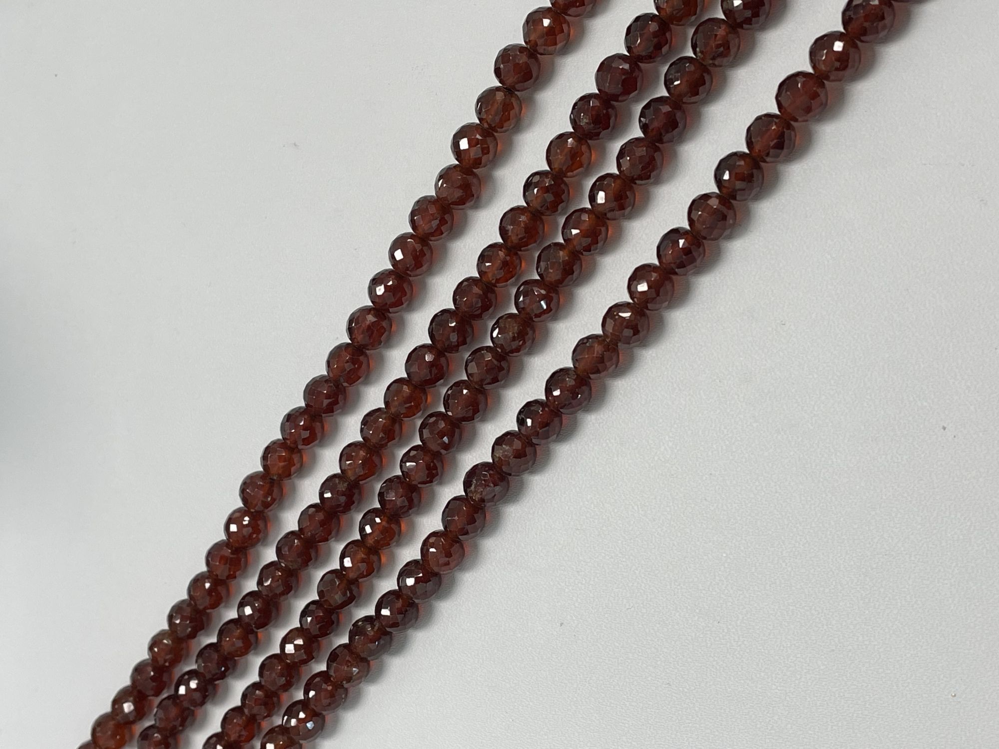 Hessonite Garnet Round Faceted