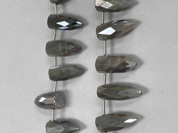 Coated Moonstone Bullet Faceted