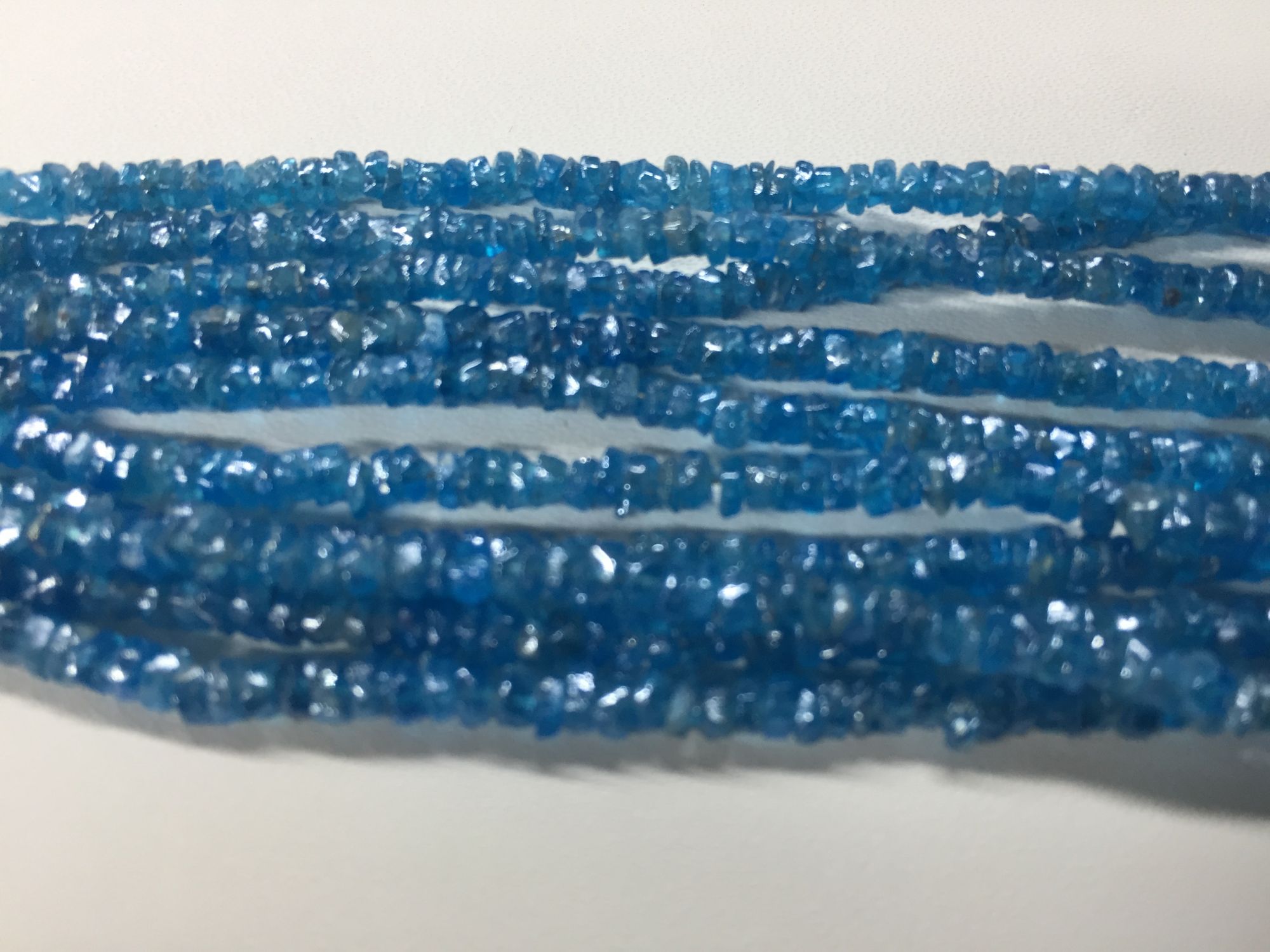 Peacock Apatite Rondelles Faceted coated