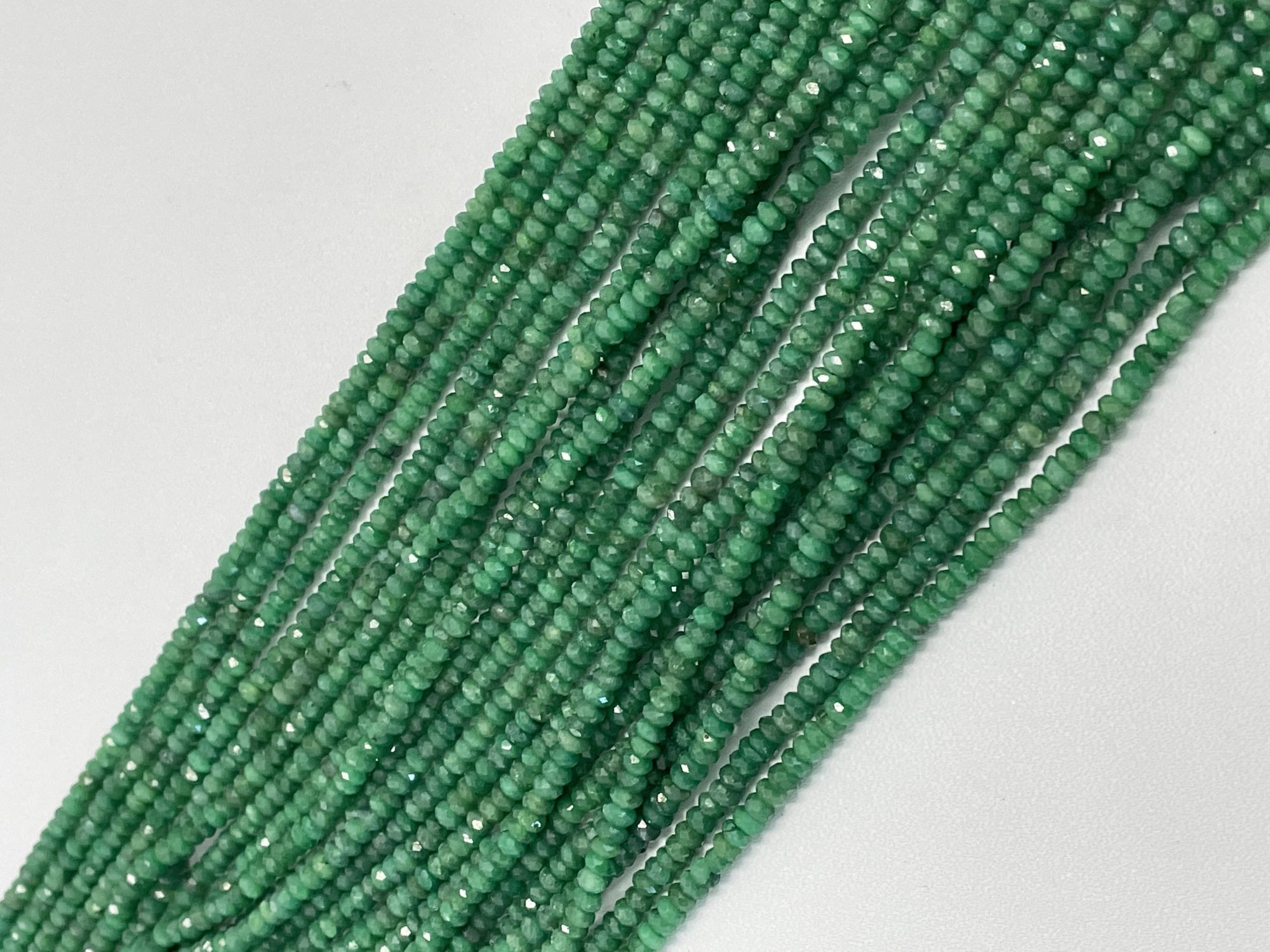 Oiled Emerald Rondelle Faceted