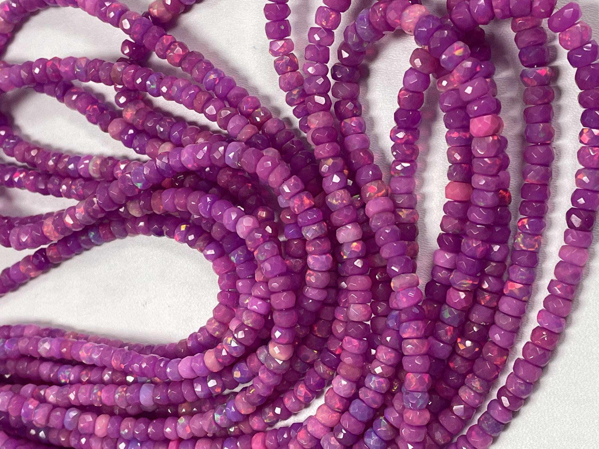 Purple Ethiopian Opal Rondelle Faceted