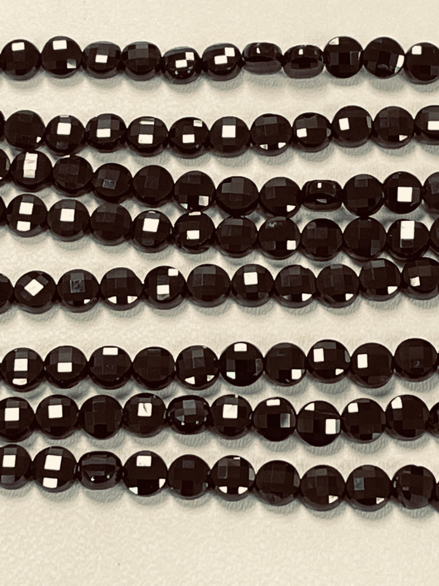 Black Spinel Coin Faceted