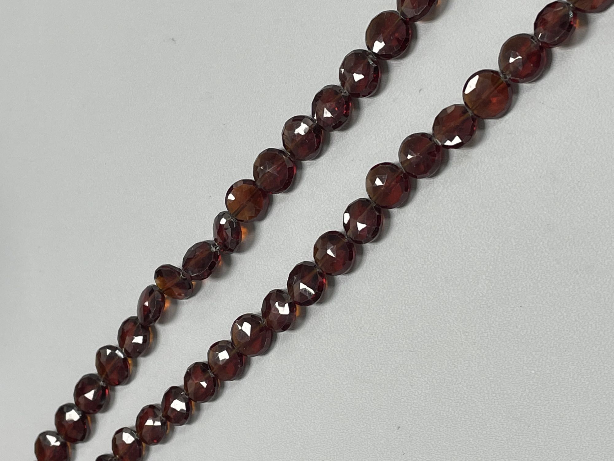 Red Garnet Coin Faceted