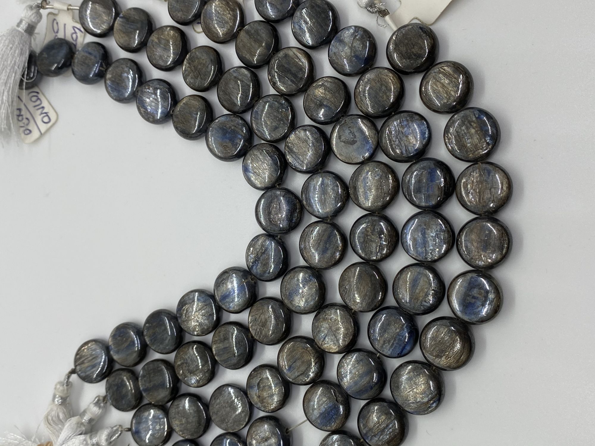 Coated Kyanite Coin Smooth