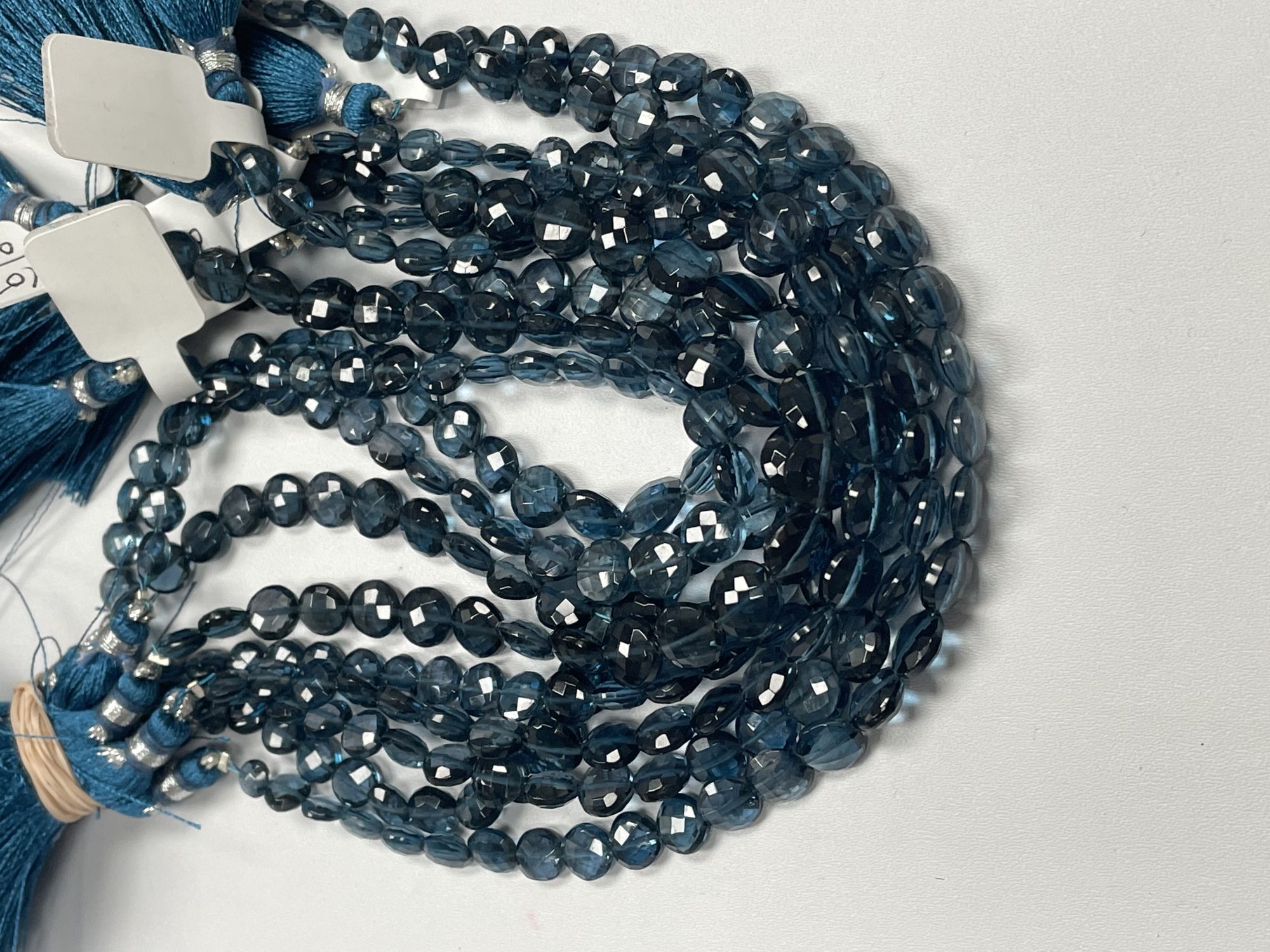 London Blue Topaz Coin Faceted