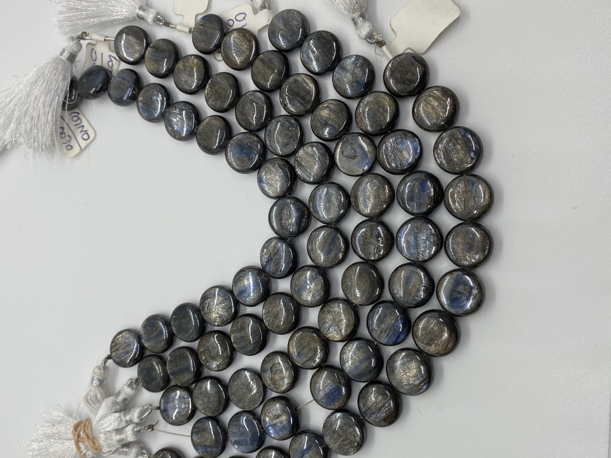 Coated Kyanite Coin Smooth