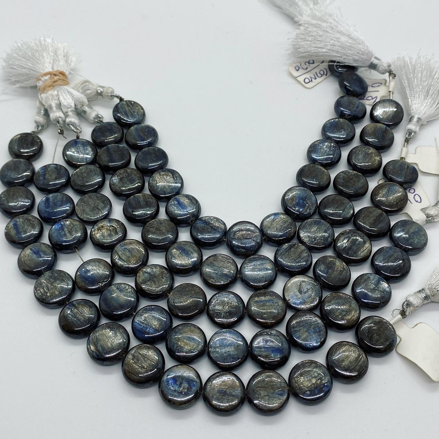 Coated Kyanite Coin Smooth