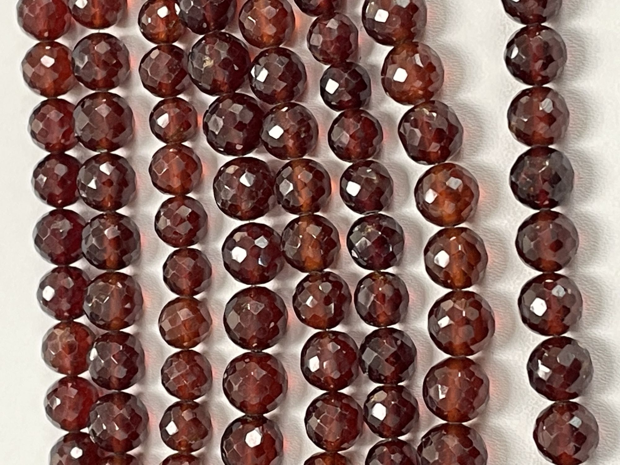 Hessonite Garnet Round Faceted