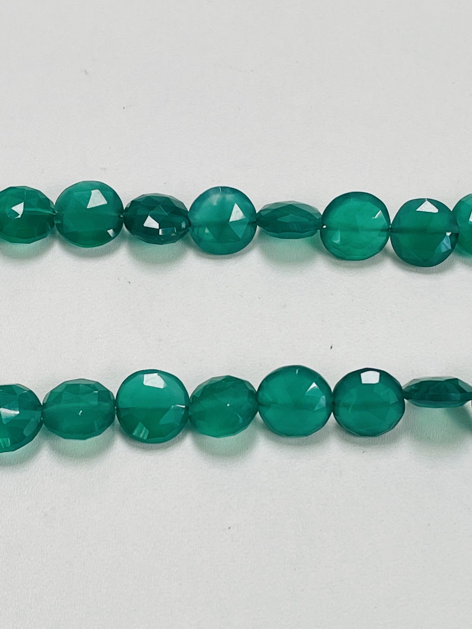 Green Onyx Coin Faceted