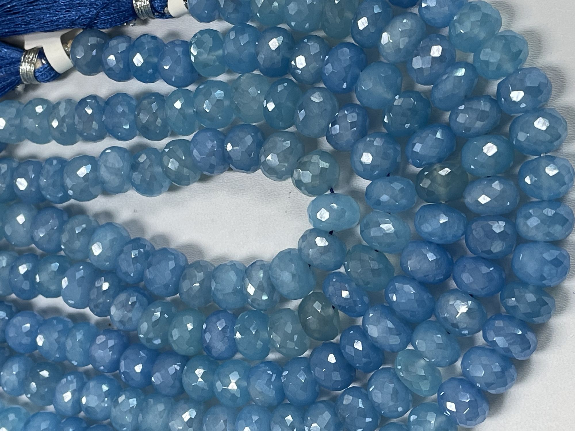 Coated Blue Chalcedony Rondelle Faceted