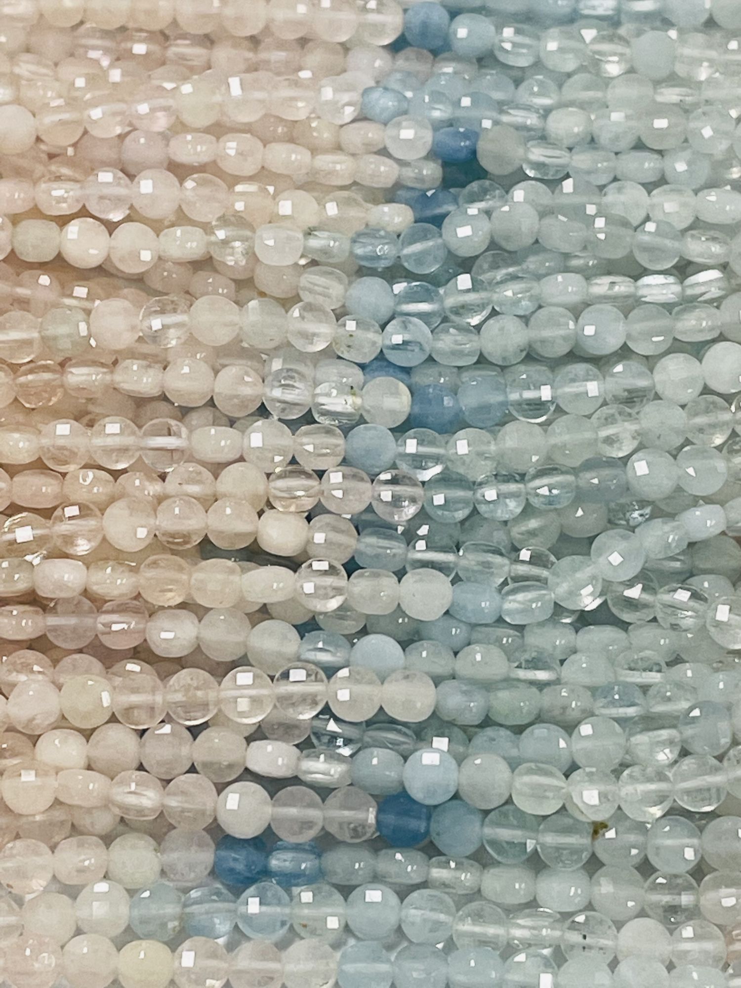 Multi Aquamarine Coin Faceted