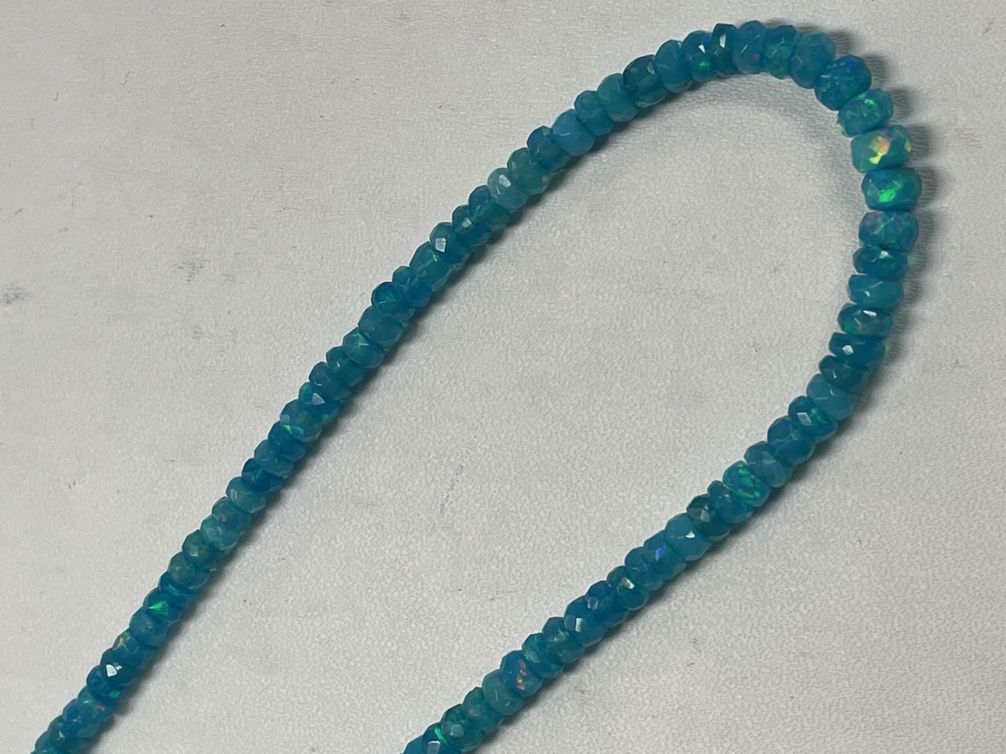 Blue Ethiopian Opal Rondelle Faceted