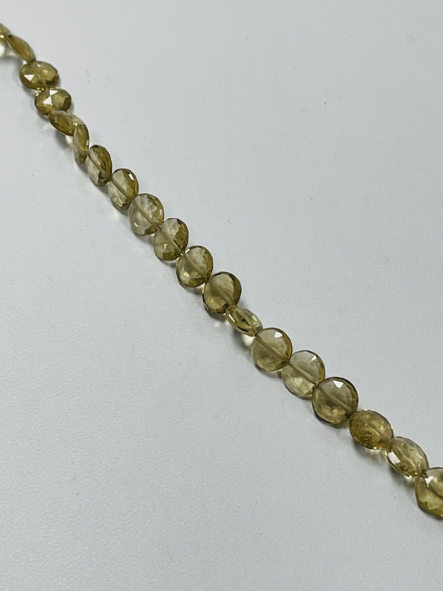 Champagne Quartz Coin Faceted