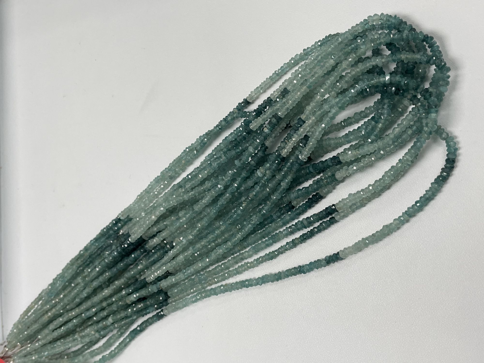 Shaded Grandidierite Rondelle Faceted