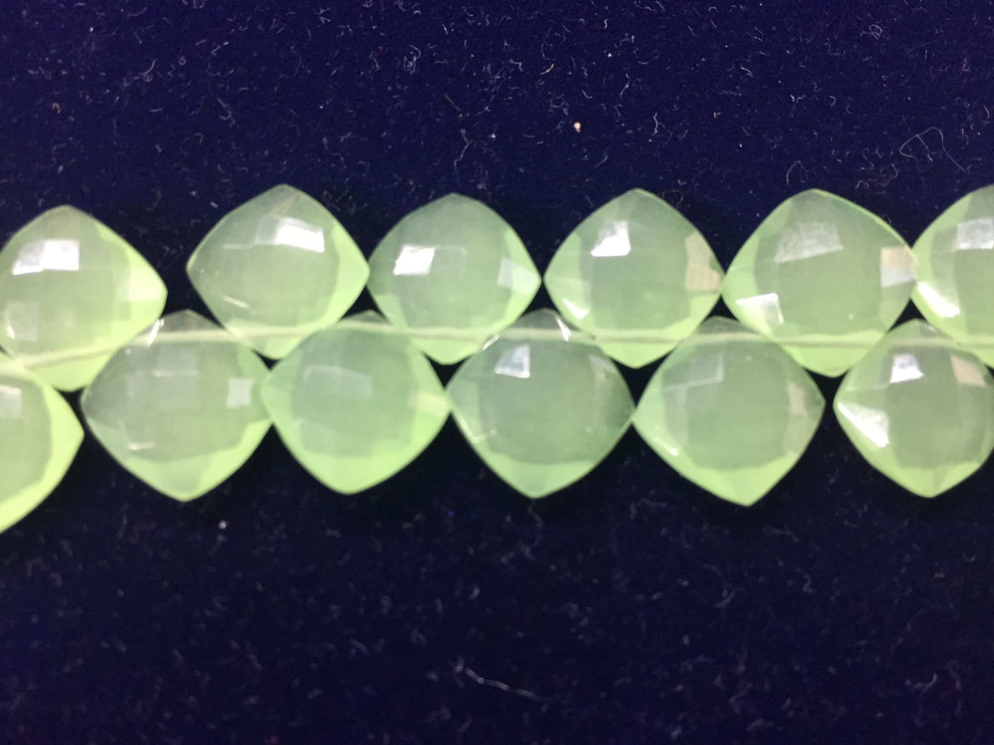 Green chalcedony cushion faceted