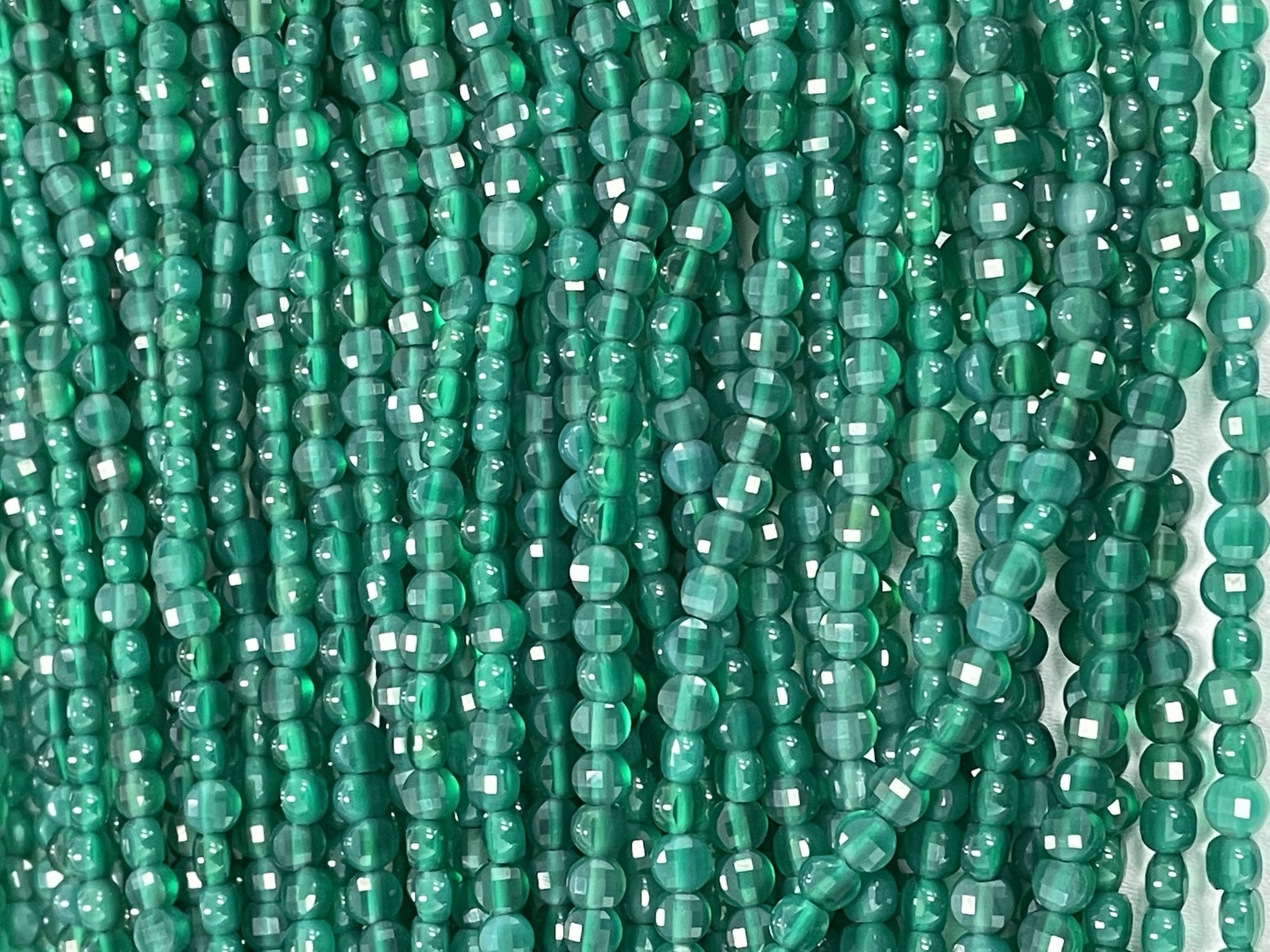 Green Onyx Coin Faceted