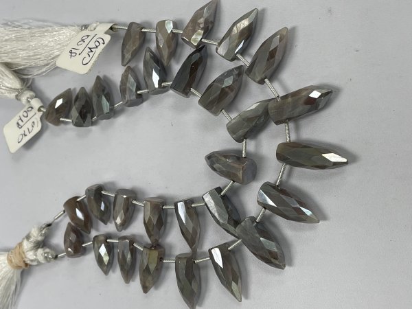 Coated Moonstone Bullet Faceted