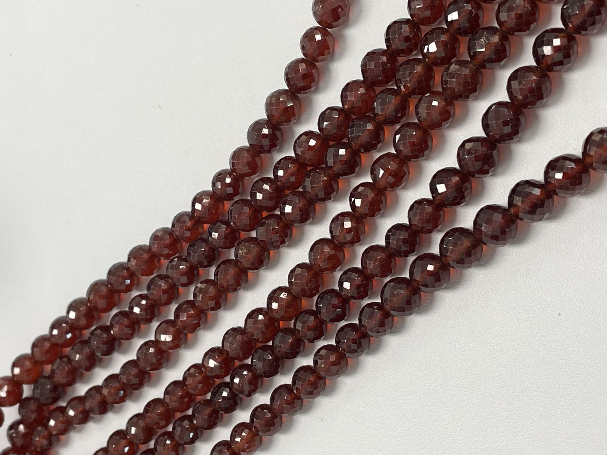 Hessonite Garnet Round Faceted