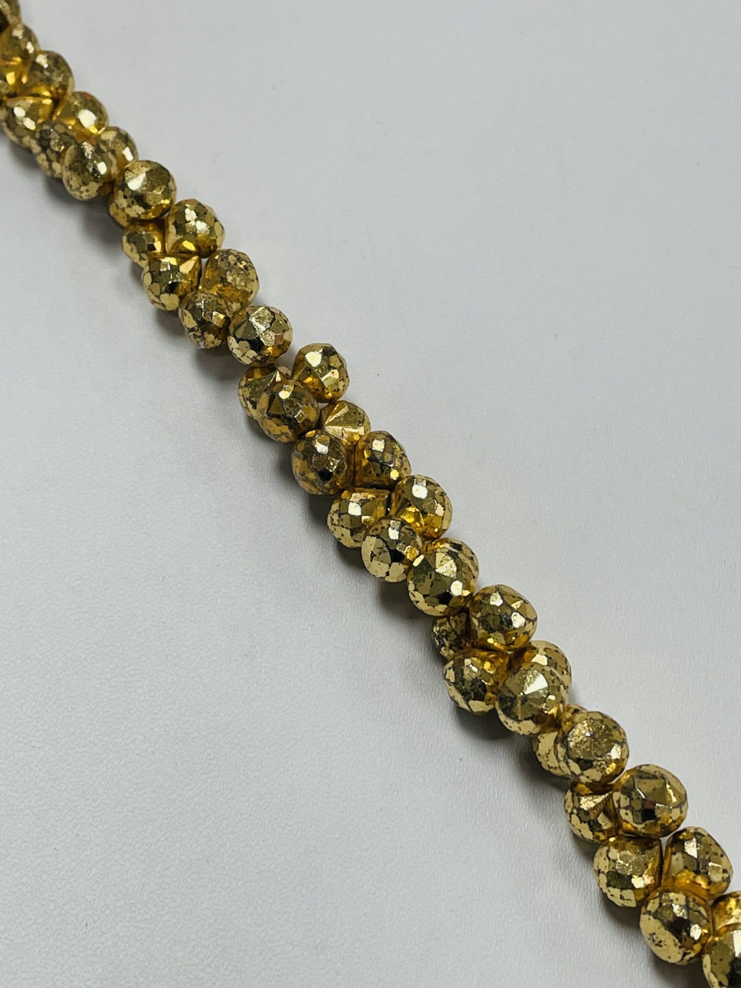 Gold Coated Pyrite Onions Faceted