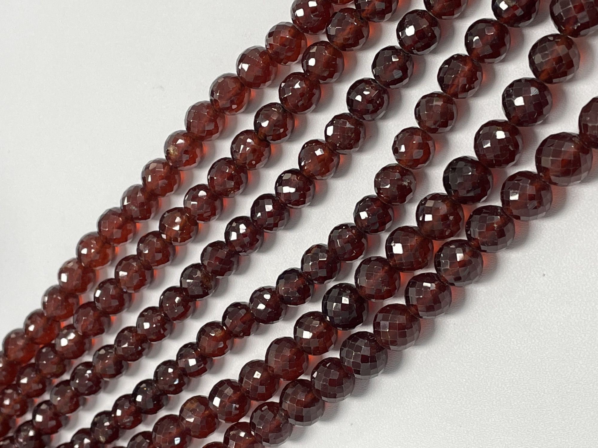 Hessonite Garnet Round Faceted