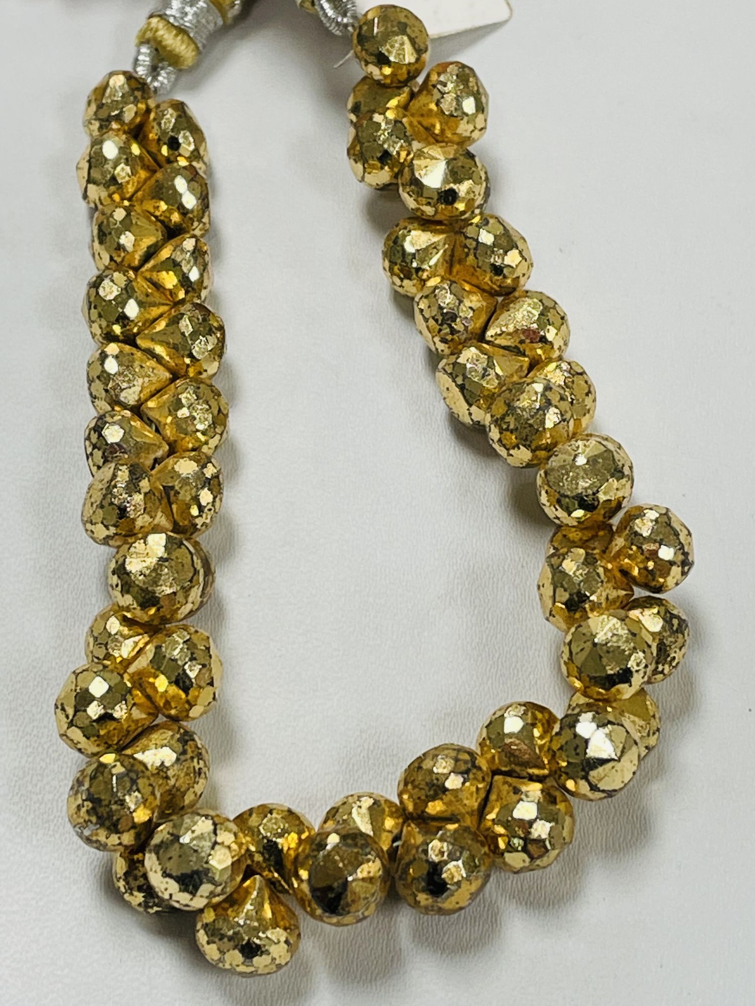 Gold Coated Pyrite Onions Faceted