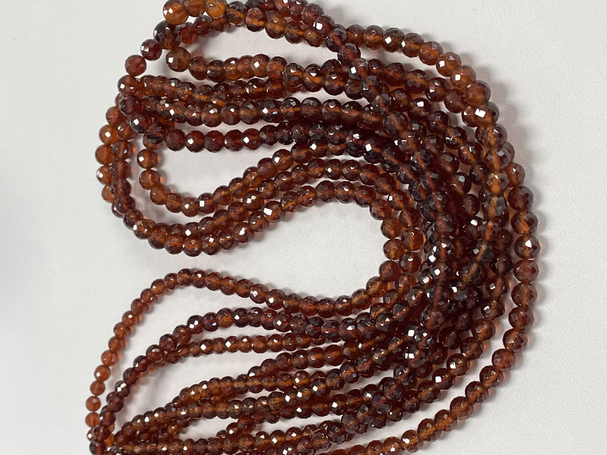 Hessonite Garnet Round Faceted
