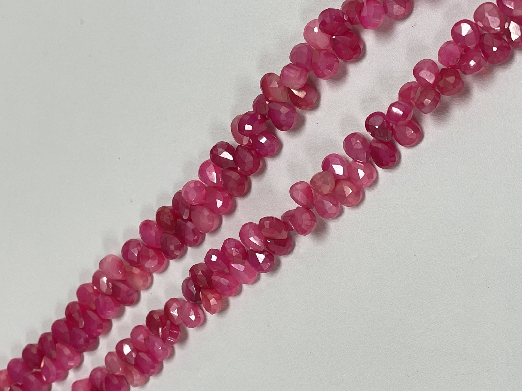 Coated Pink Chalcedony Pear Faceted