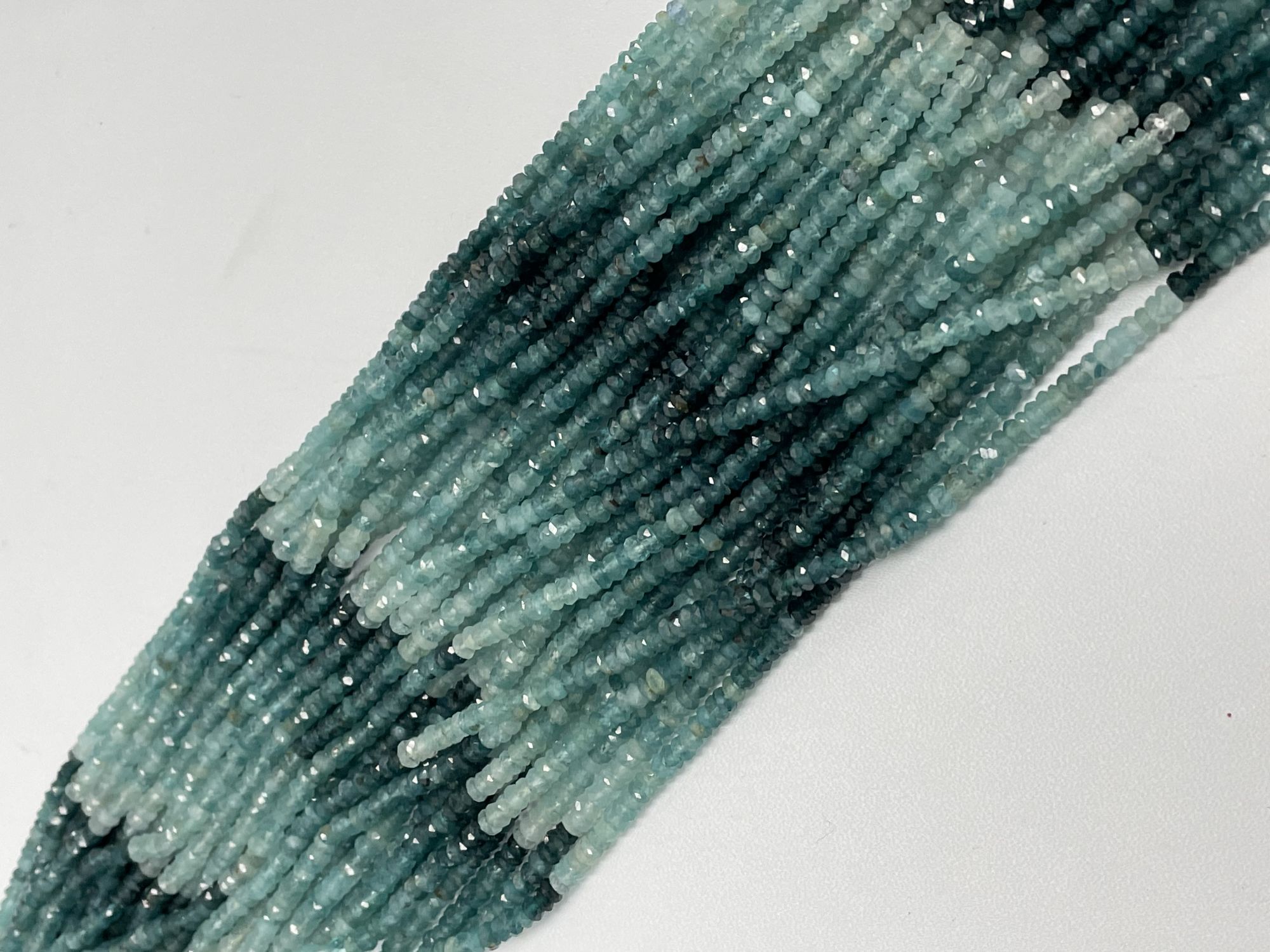 Shaded Grandidierite Rondelle Faceted