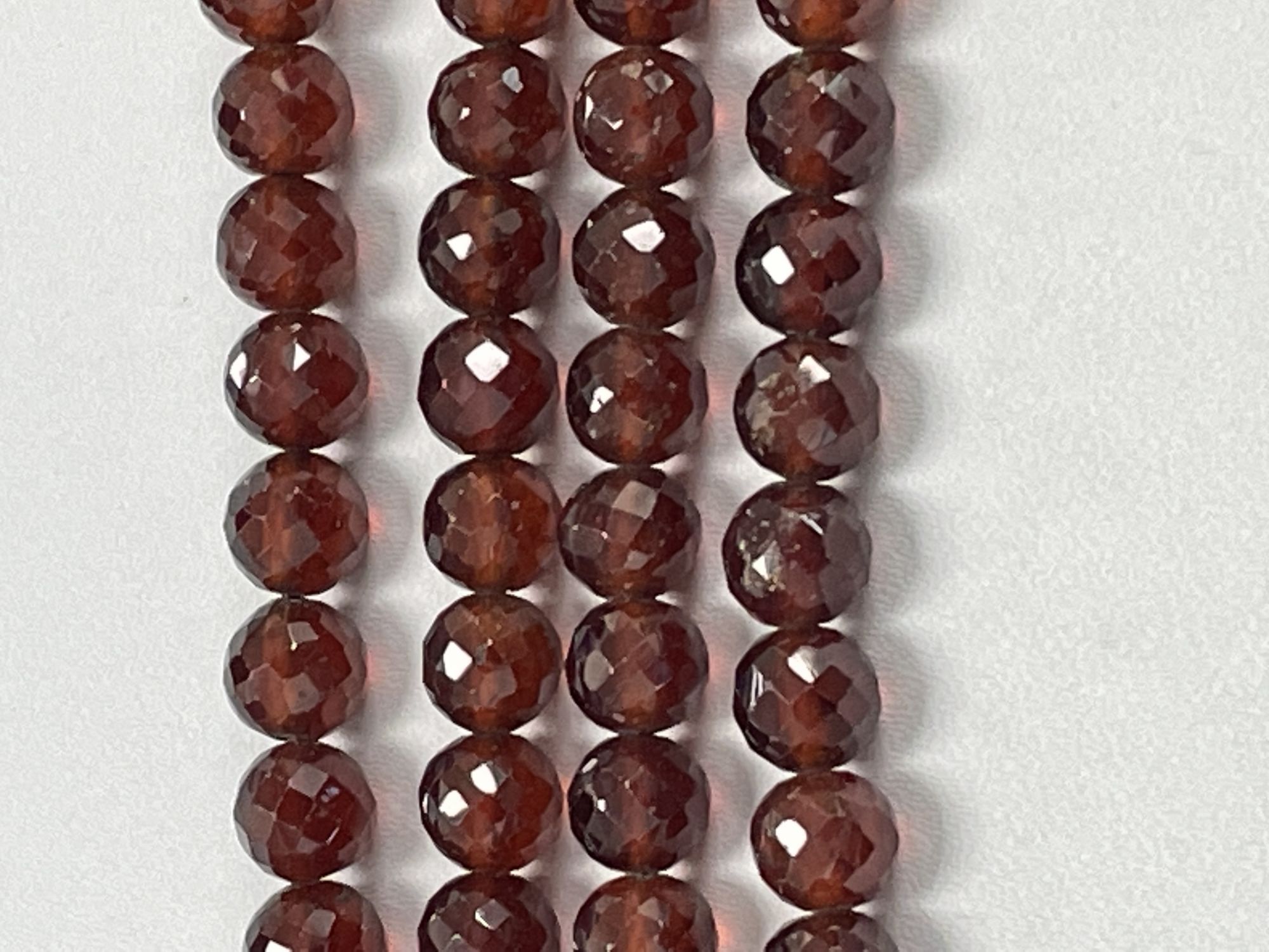 Hessonite Garnet Round Faceted