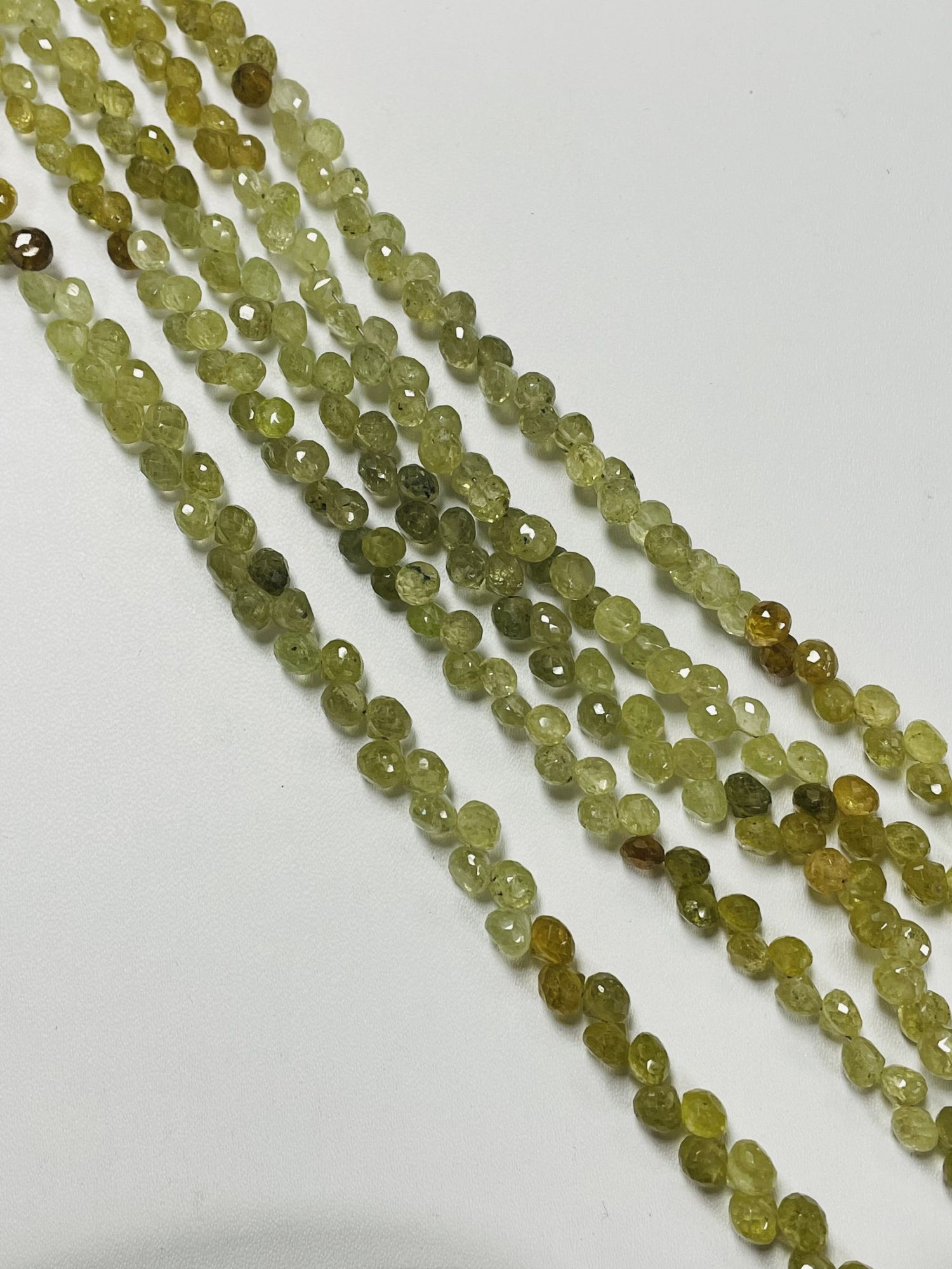 Green Grossular Garnet Onion Faceted